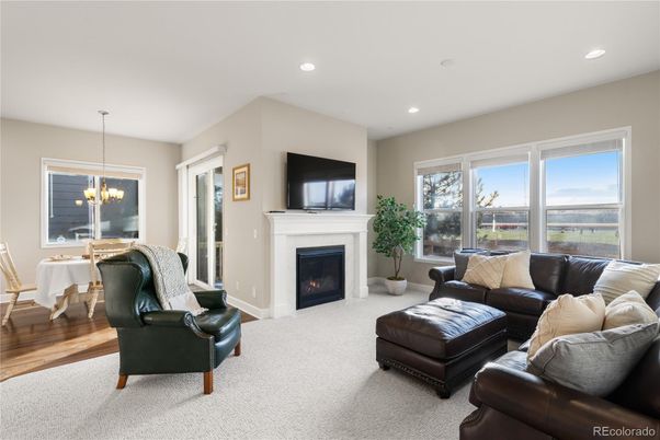 Dining room, Fireplace, Interior, Living room, Recessed Lighting, Wood Texture Flooring