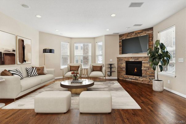 Fireplace, Interior, Living room, Recessed Lighting, Stone Walls, Wood Texture Flooring