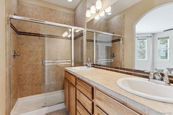 Bathroom, Dual Sink Vanities, Glass Shower, Interior, Recessed Lighting, Tile Countertops