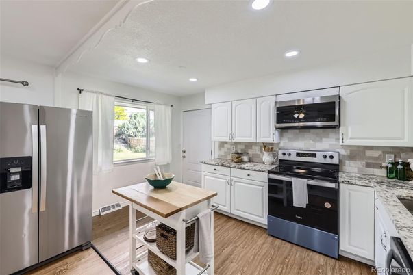 Interior, Kitchen, Recessed Lighting, Stainless Steel Appliances, Wood Texture Flooring
