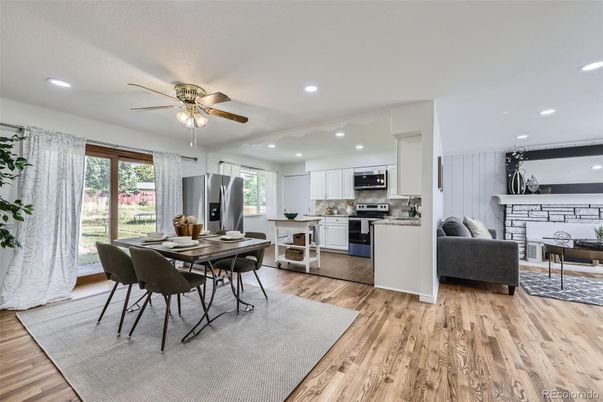 Dining room, Interior, Kitchen, Living room, Recessed Lighting, Stainless Steel Appliances, Wood Texture Flooring
