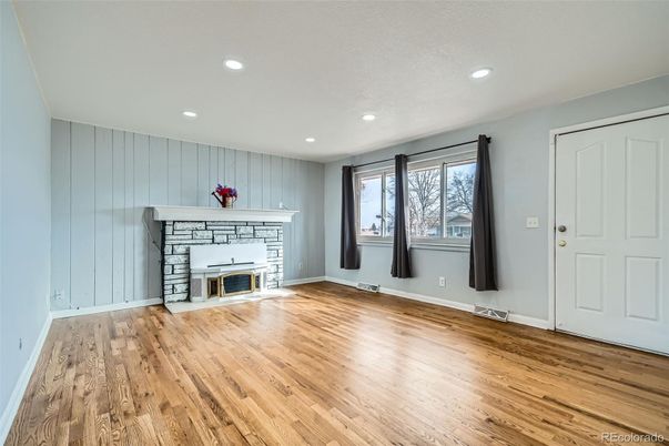 Empty room, Fireplace, Interior, Recessed Lighting, Wood Texture Flooring