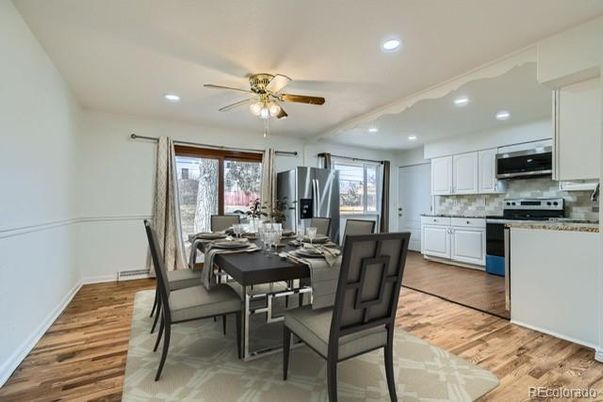Dining room, Interior, Kitchen, Recessed Lighting, Stainless Steel Appliances, Wood Texture Flooring