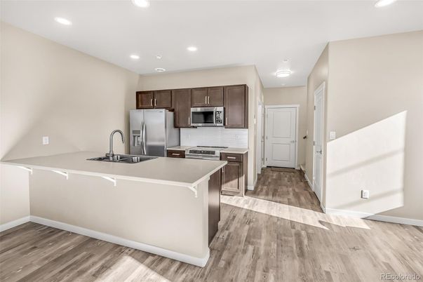 Interior, Kitchen, Recessed Lighting, Stainless Steel Appliances, Wood Texture Flooring