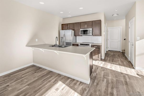 Interior, Kitchen, Recessed Lighting, Stainless Steel Appliances, Wood Texture Flooring
