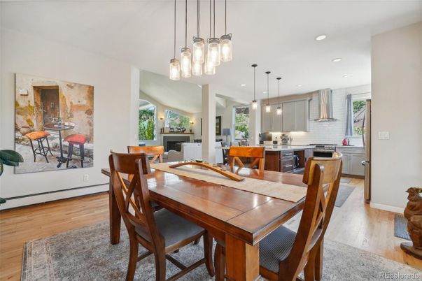 Dining room, Interior, Kitchen, Pendant Lights, Recessed Lighting, Stainless Steel Appliances, Wood Texture Flooring