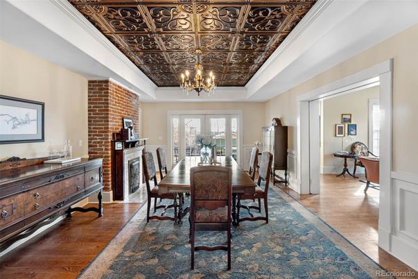 Chandelier, Dining room, Fireplace, Interior, Stone Walls, Wood Texture Flooring