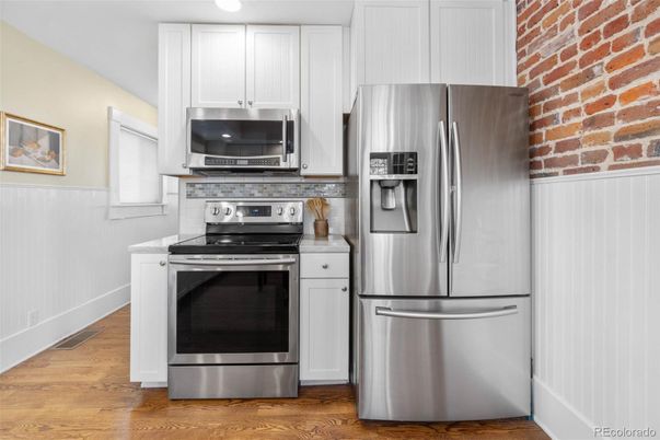 Interior, Kitchen, Stainless Steel Appliances, Stone Walls, Wood Texture Flooring