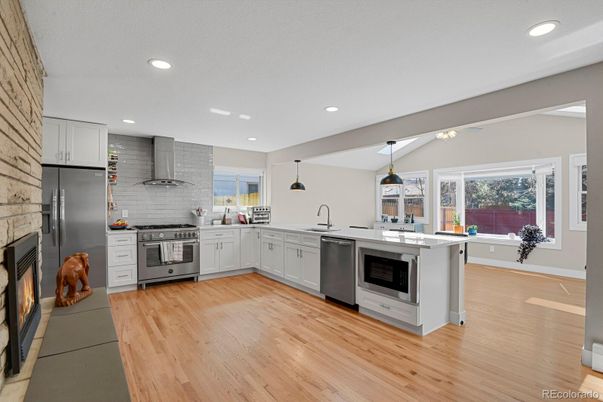Interior, Kitchen, Pendant Lights, Recessed Lighting, Stainless Steel Appliances, Wood Texture Flooring