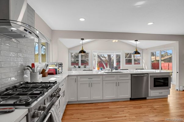 Interior, Kitchen, Pendant Lights, Recessed Lighting, Stainless Steel Appliances, Wood Texture Flooring