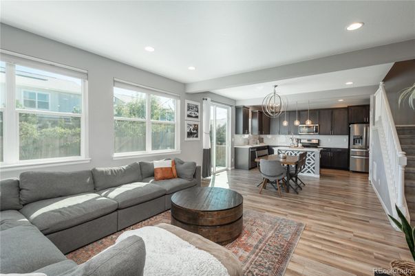 Chandelier, Dining room, Interior, Kitchen, Living room, Recessed Lighting, Stainless Steel Appliances, Wood Texture Flooring