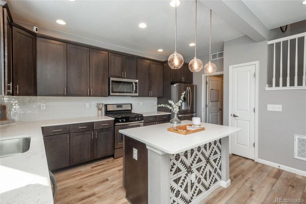 Interior, Kitchen, Pendant Lights, Recessed Lighting, Stainless Steel Appliances, Wood Texture Flooring
