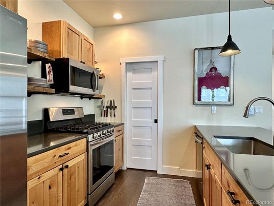 Interior, Kitchen, Pendant Lights, Recessed Lighting, Stainless Steel Appliances, Wood Texture Flooring