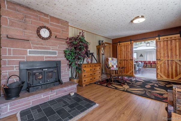 Dining room, Fireplace, Interior, Stone Walls, Wood Texture Flooring