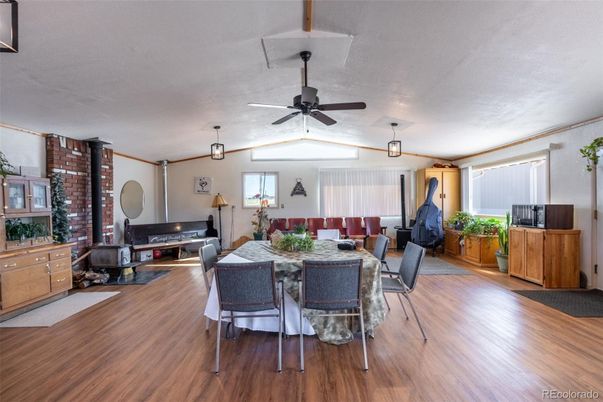 Dining room, Fireplace, Interior, Pendant Lights, Stone Walls, Wood Texture Flooring