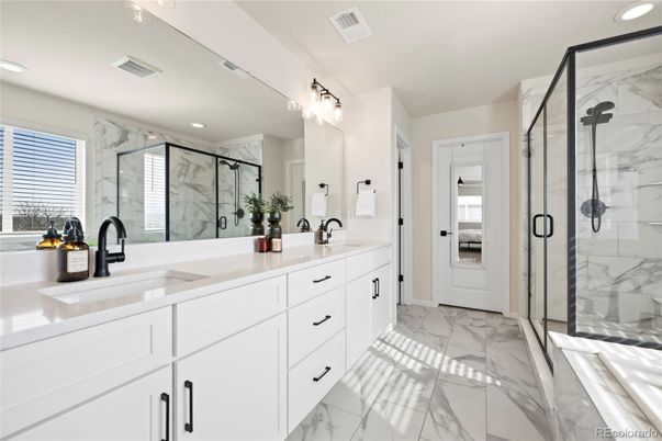 Bathroom, Dual Sink Vanities, Glass Shower, Interior, Marble, Marble Walls, Recessed Lighting