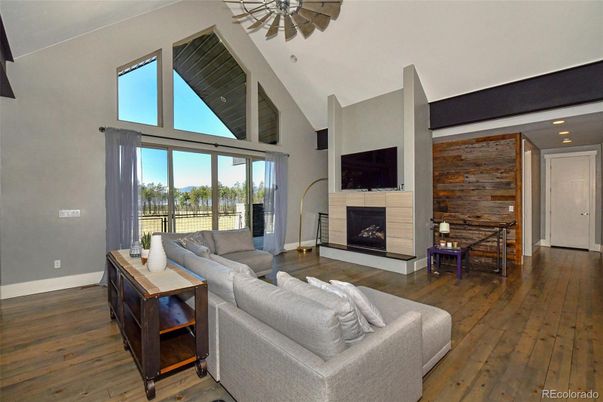 Fireplace, Interior, Living room, Recessed Lighting, Wood Texture Flooring, Wooden Walls