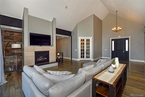 Chandelier, Fireplace, Interior, Living room, Recessed Lighting, Wood Texture Flooring
