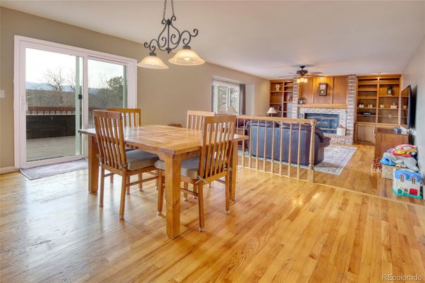 Dining room, Fireplace, Interior, Living room, Pendant Lights, Wood Texture Flooring