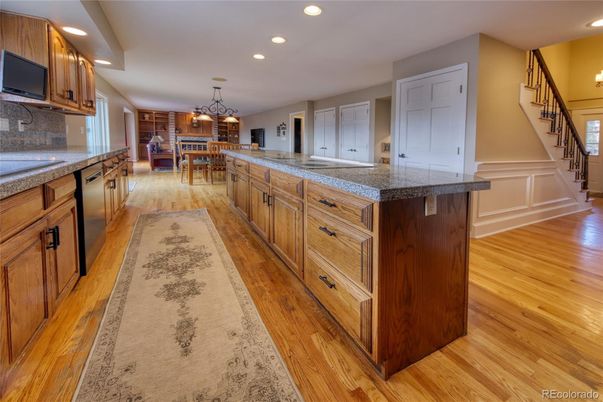 Dining room, Interior, Kitchen, Pendant Lights, Recessed Lighting, Stainless Steel Appliances, Wood Texture Flooring