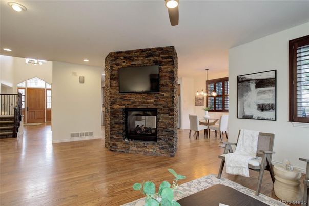 Dining room, Fireplace, Interior, Pendant Lights, Recessed Lighting, Stone Walls, Wood Texture Flooring