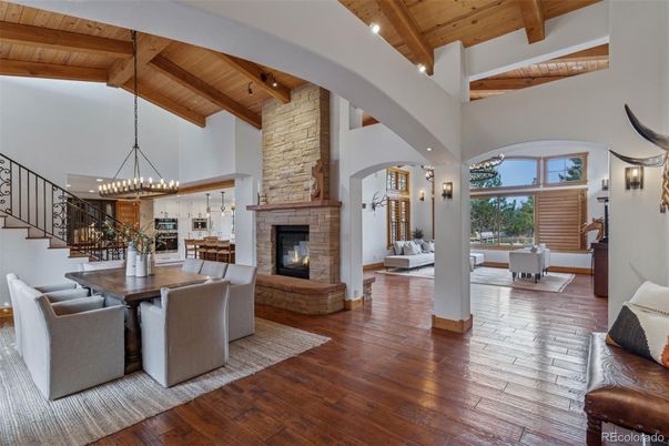 Chandelier, Dining room, Fireplace, Interior, Kitchen, Living room, Pendant Lights, Wooden Beams, Wooden Ceilings, Wood Texture Flooring