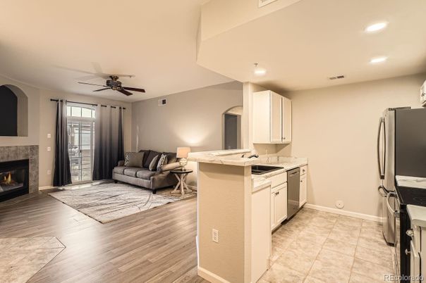 Fireplace, Interior, Kitchen, Living room, Recessed Lighting, Wood Texture Flooring