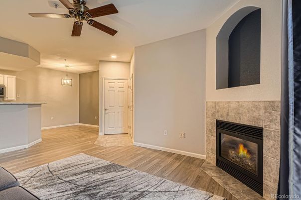 Empty room, Fireplace, Interior, Pendant Lights, Recessed Lighting, Wood Texture Flooring