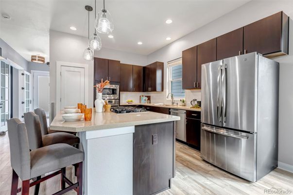Interior, Kitchen, Pendant Lights, Recessed Lighting, Stainless Steel Appliances, Wood Texture Flooring