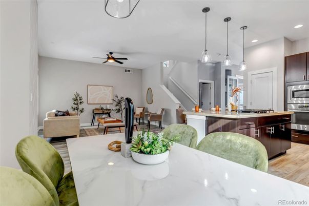 Dining room, Interior, Kitchen, Pendant Lights, Recessed Lighting, Stainless Steel Appliances, Wood Texture Flooring