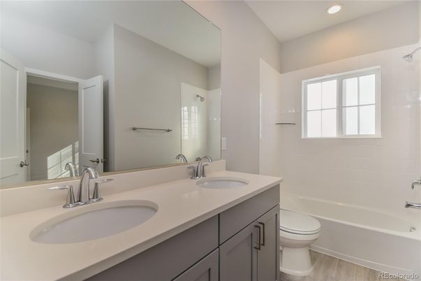 Bathroom, Dual Sink Vanities, Interior, Recessed Lighting, Wood Texture Flooring