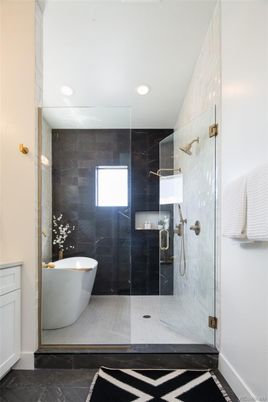 Bathroom, Free Standing Baths, Glass Shower, Interior, Marble Walls, Recessed Lighting