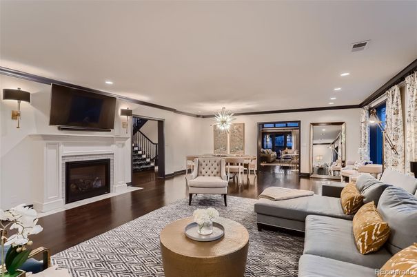 Dining room, Fireplace, Interior, Living room, Pendant Lights, Recessed Lighting, Wood Texture Flooring