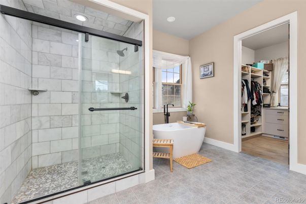 Bathroom, Free Standing Baths, Glass Shower, Interior, Recessed Lighting, Walk-in Closets, Wood Texture Flooring