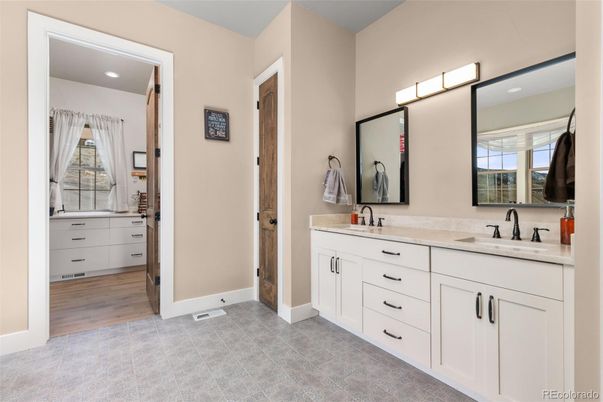 Bathroom, Dual Sink Vanities, Interior, Recessed Lighting, Wood Texture Flooring