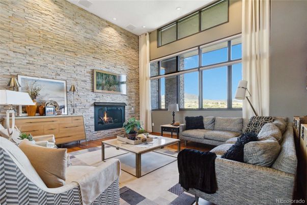 Fireplace, Interior, Living room, Recessed Lighting, Stone Walls, Wood Texture Flooring