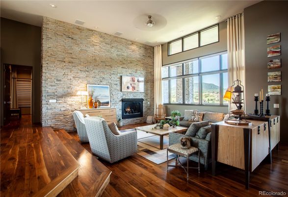 Fireplace, Interior, Living room, Recessed Lighting, Stone Walls, Wood Texture Flooring