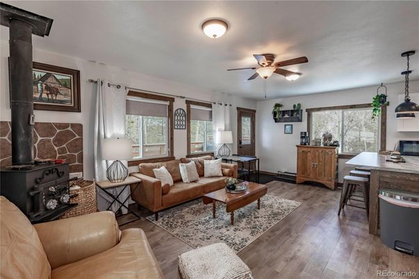 Dining room, Fireplace, Interior, Kitchen, Living room, Pendant Lights, Wood Texture Flooring