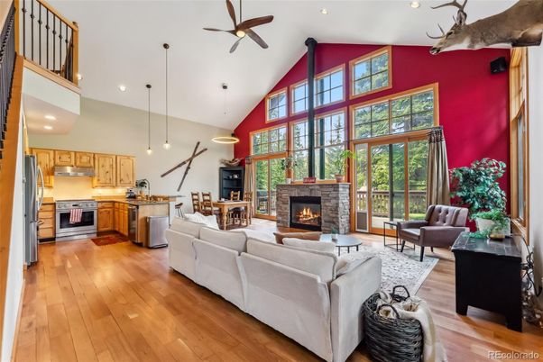 Dining room, Fireplace, Interior, Kitchen, Living room, Pendant Lights, Recessed Lighting, Stainless Steel Appliances, Wood Texture Flooring