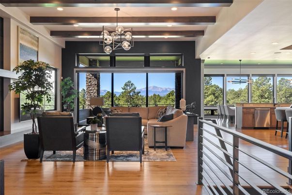 Dining room, Fireplace, Interior, Living room, Pendant Lights, Recessed Lighting, Wooden Beams, Wood Texture Flooring