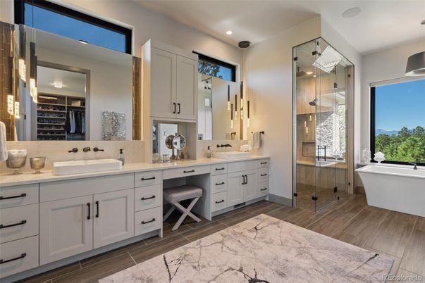Bathroom, Dual Sink Vanities, Free Standing Baths, Glass Shower, Interior, Recessed Lighting, Wood Texture Flooring