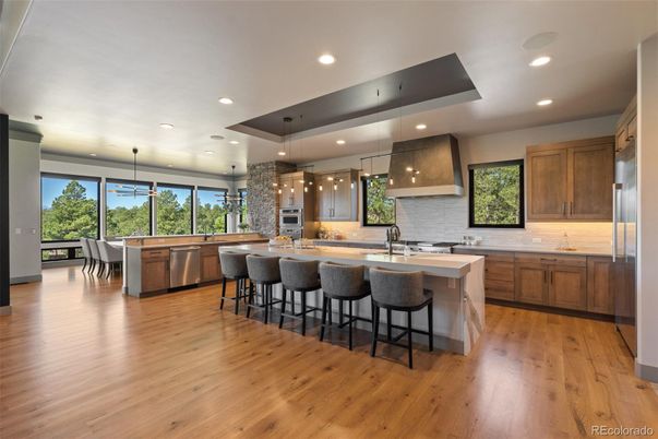 Dining room, Interior, Kitchen, Pendant Lights, Recessed Lighting, Stainless Steel Appliances, Wood Texture Flooring