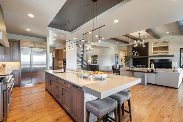 Chandelier, Interior, Kitchen, Living room, Pendant Lights, Recessed Lighting, Stainless Steel Appliances, Wooden Beams, Wood Texture Flooring