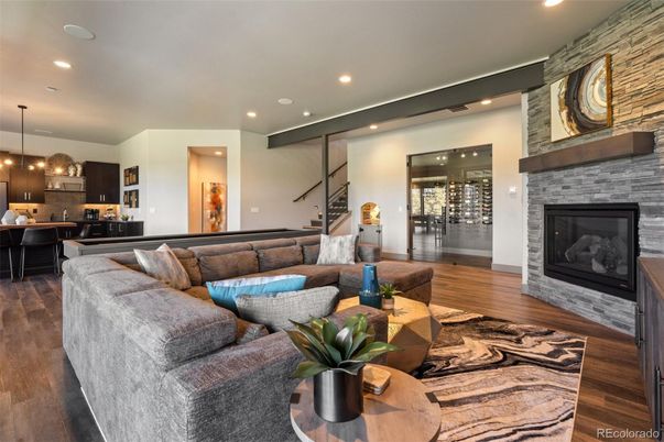 Fireplace, Interior, Kitchen, Living room, Pendant Lights, Recessed Lighting, Stone Walls, Wood Texture Flooring