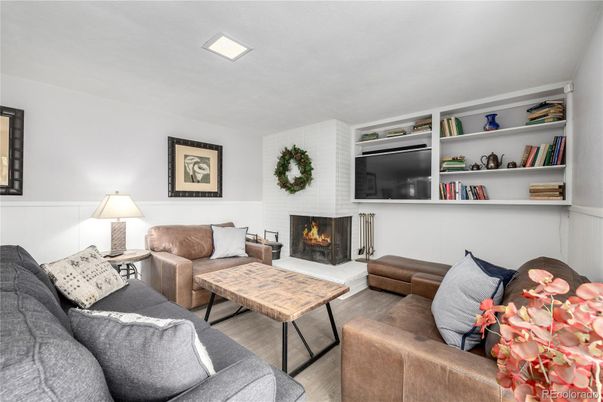 Fireplace, Interior, Living room, Recessed Lighting, Wood Texture Flooring