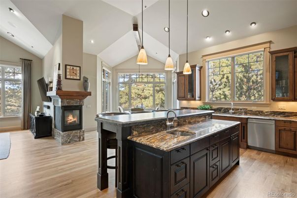 Fireplace, Interior, Kitchen, Pendant Lights, Recessed Lighting, Stainless Steel Appliances, Wood Texture Flooring