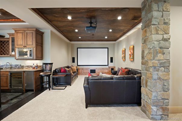 Interior, Living room, Projection Screen, Recessed Lighting, Stone Walls, Theatre Room, Wooden Ceilings