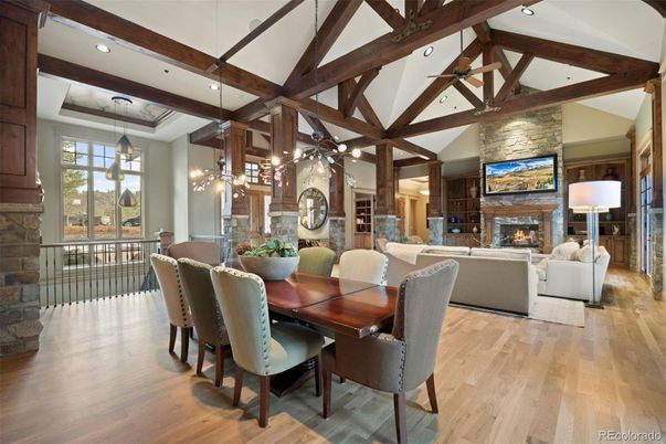 Dining room, Fireplace, Interior, Living room, Pendant Lights, Recessed Lighting, Stone Walls, Wooden Beams, Wood Texture Flooring