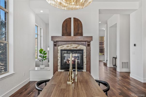 Chandelier, Dining room, Fireplace, Interior, Recessed Lighting, Wood Texture Flooring