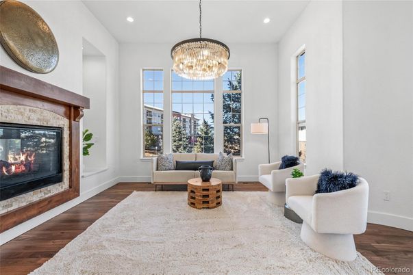 Chandelier, Fireplace, Interior, Living room, Recessed Lighting, Wood Texture Flooring